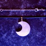 CRESCENT MOON PENDANT IN ROSE QUARTZ ON WAXED CORD.   SPR13966PEND