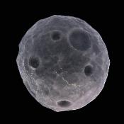 Carving Of A Dwarf Moon Or Planetoid In Silver Sheen Obsidian.   SP17112