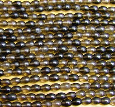 SMOKEY QUARTZ RICE BEADS ON A STRING. SPR6037