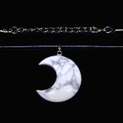 CRESCENT MOON PENDANT IN HOWLITE ON WAXED CORD.   SPR16896