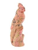 Carving of a Cockatiel perched on a tree stump in Rhodonite.   SP16316POL