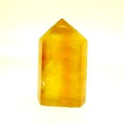 GEMSTONE POLISHED AND FACETED POINT IN DARK HONEY CALCITE.   SP13894POL