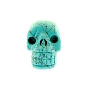 SKULL CARVING IN BLUE HOWLITE.   SP14175POL