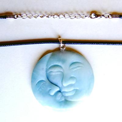 MAN IN THE MOON CARVED PENDANT IN CHINESE AMAZONITE ON WAXED CORD.   SPR13954PEND