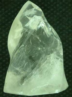 SPIRAL CARVED POLISHED QUARTZ POINT. 95 X 67 X 49MM APROX. 340g. SP551POL