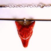 CARVED WOLF'S HEAD PENDANT IN RED JASPER ON WAXED CORD.    SPR13951PEND