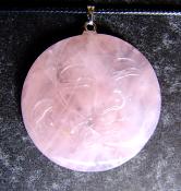 MAN IN THE MOON CARVED PENDANT IN ROSE QUARTZ ON WAXED CORD.   SPR13956PEND