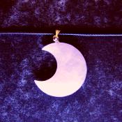 CRESCENT MOON PENDANT IN ROSE QUARTZ ON WAXED CORD.   SPR13966PEND