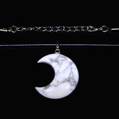 CRESCENT MOON PENDANT IN HOWLITE ON WAXED CORD.   SPR16896