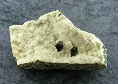 BLACK CALCITE CRYSTALS ON SHAMANITE DRUZE. SP7010