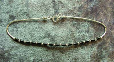 SILVER & TUBULAR BEAD BRACELET. 109NBX