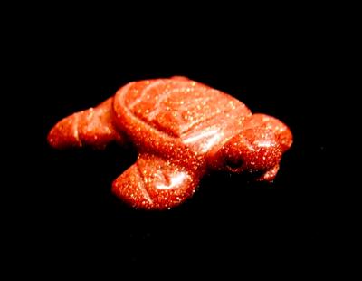 CARVING OF A TURTLE IN COPPER GOLDSTONE.   SP12235POL