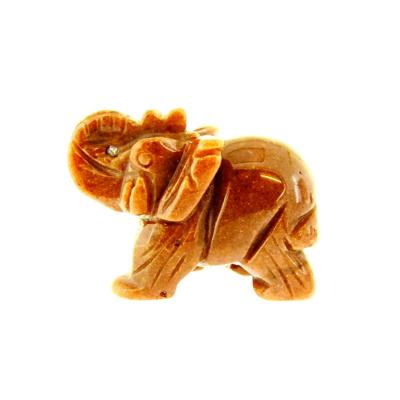 CARVING OF AN ELEPHANT IN STRAWBERRY QUARTZ.   SP13904POL