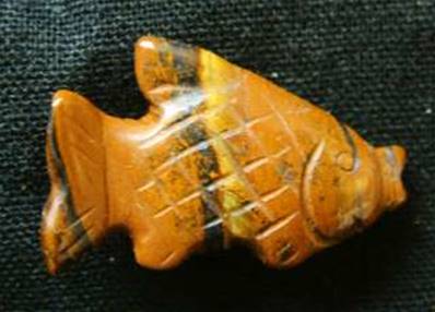 CARVING OF FISH IN TIGERS EYE. SPR3978POL