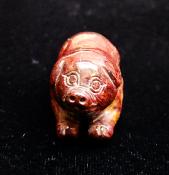 CARVING OF PIG IN PIETERSITE.   SP11322POL