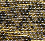SMOKEY QUARTZ RICE BEADS ON A STRING. SPR6037