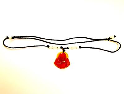 CARNELIAN BUDDHA PENDANT ON A BEADED AJUSTABLE CORD.   SPR13942PEND