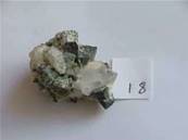 TOURMALINE AND QUARTZ SPECIMEN 3CM X 4.5CM ACROSS. SP18