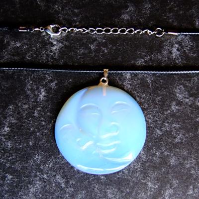 MAN IN THE MOON CARVED PENDANT IN OPALITE ON WAXED CORD.   SPR13955PEND