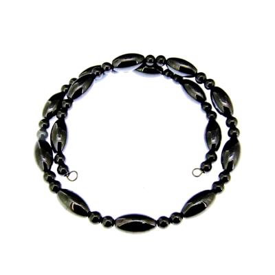 HEMATITE SPRUNG WIRE BRACELET FEATURING ROUND AND OVAL BEADS.   SPR14533BRWH